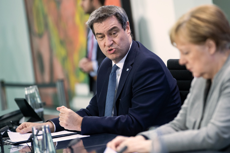 Merkel und Söder unter Druck: Landräte und Bürgermeister wollen Handel und Kinos aufsperren