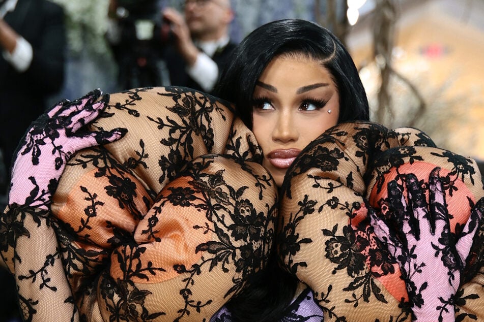 Cardi B stunned in a lacy surrealist look by Marc Jacobs at the 2026 Met Gala.