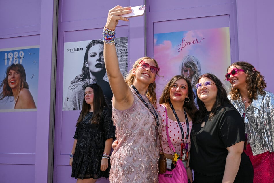 Swifties flocked to The Eras Tour dressed to the nines in 'fits inspired by Taylor herself, exchanging friendship bracelets and taking photos galore