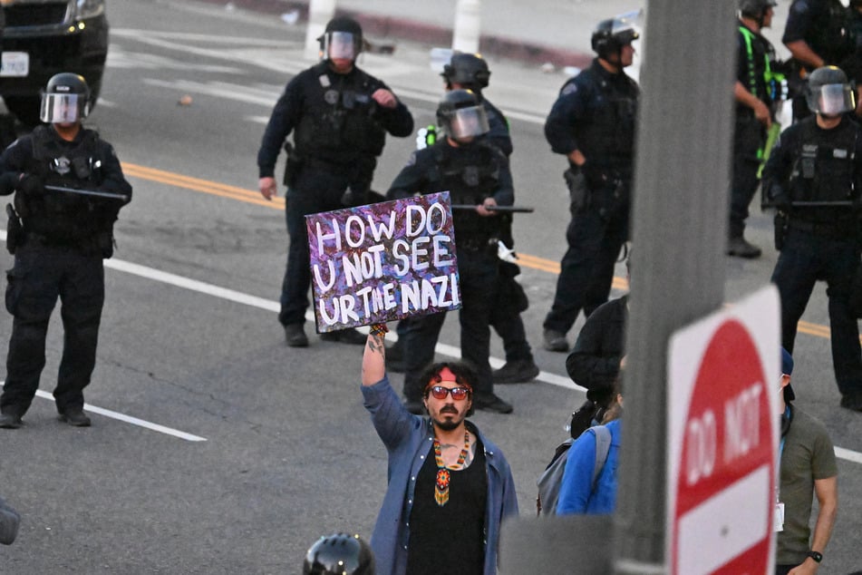LA police said it conducted mass arrests after the city's mayor imposed a curfew to crack down on widespread protests against attacks on immigrant communities.