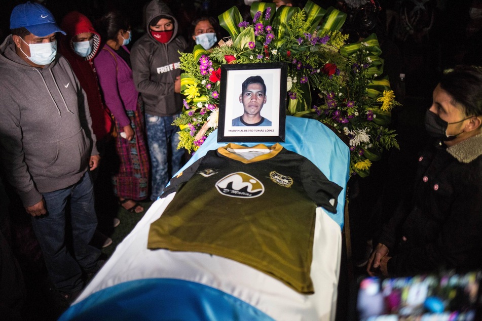 The remains of one of the 16 Guatemalan migrants murdered by Mexican police is returned home in March 2021.