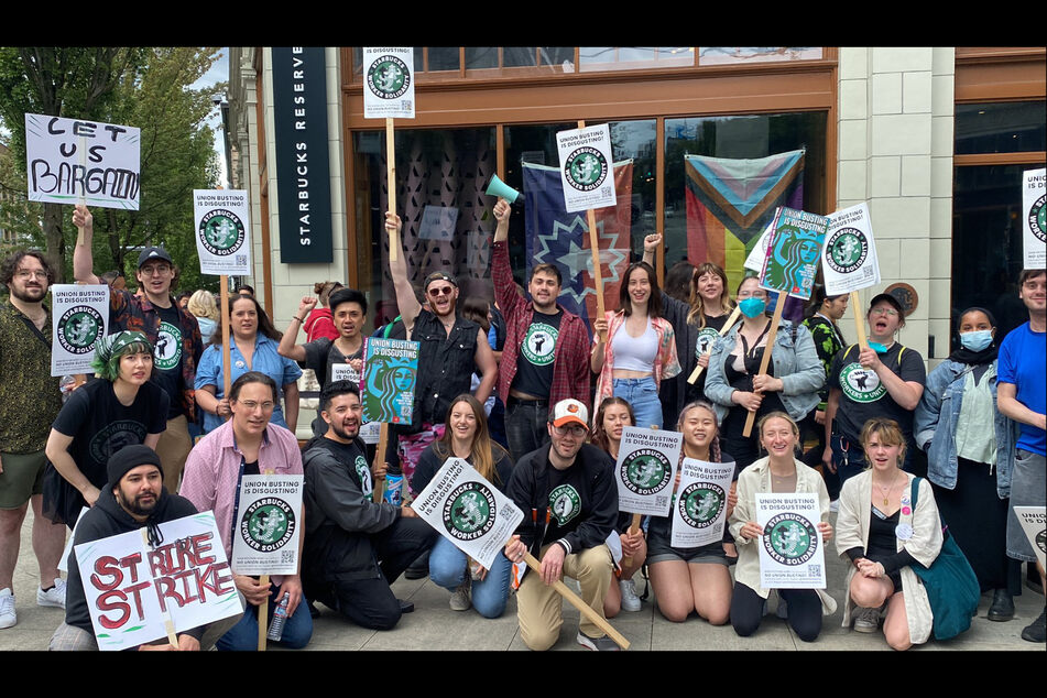 Starbucks workers and supporters picket outside the company's Seattle roastery.