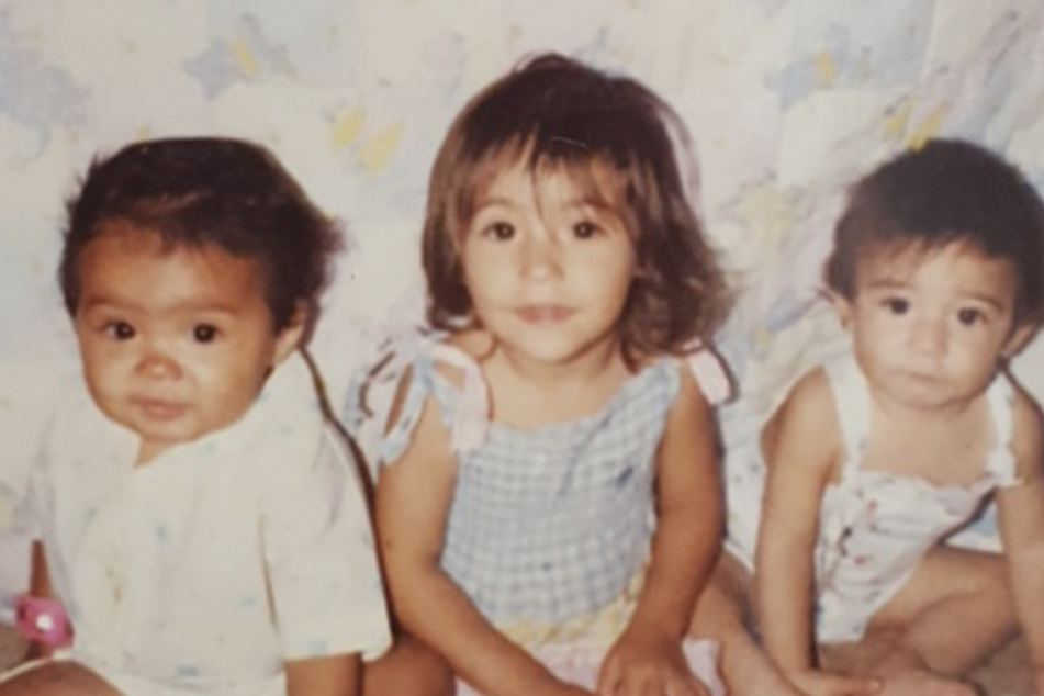 Reynoso (c.) in a childhood photo with her cousin Nicole (l.) and brother Andy (r.).