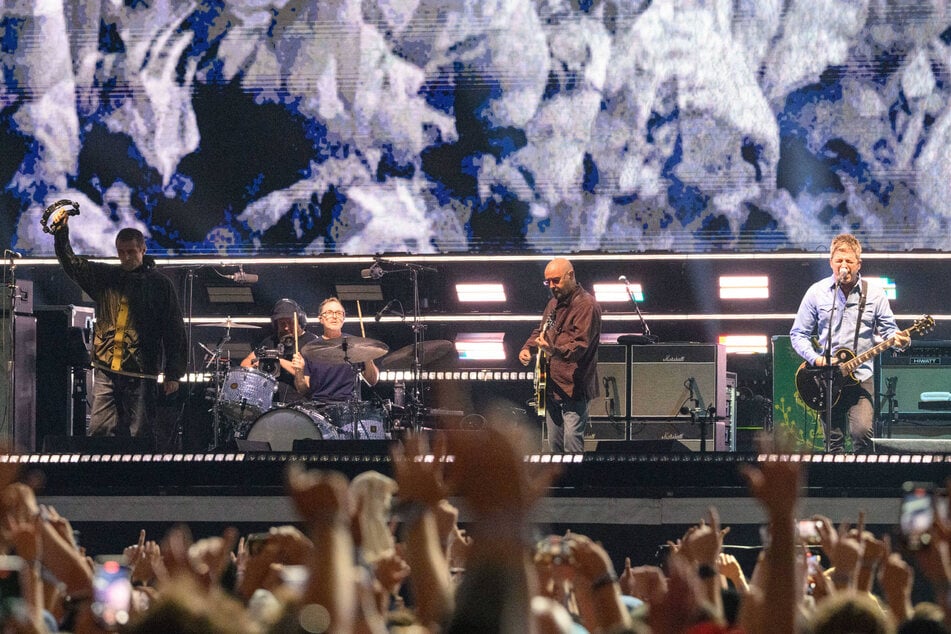 Oasis light up Cardiff Stadium in unforgettable return on Friday.