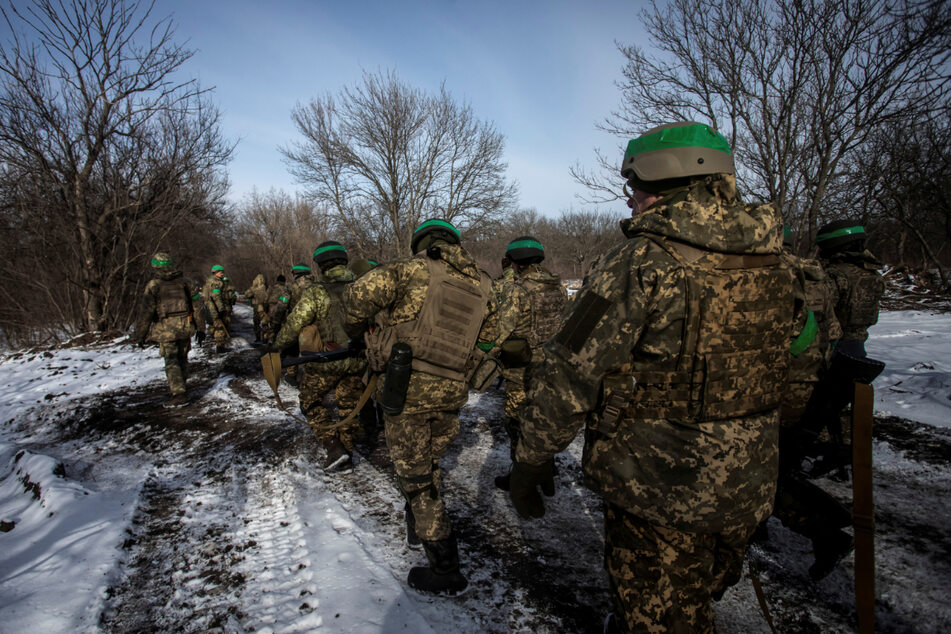 Ukrainian troops in the town of Bakhmut in the Donetsk region of Ukraine amid Russia's nearly year-long invasion.