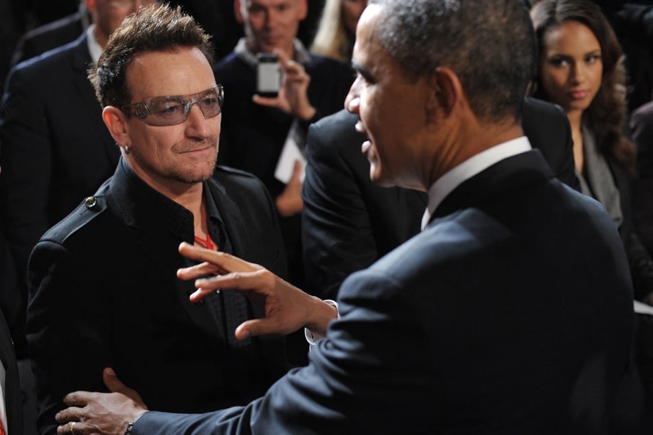 Bono (l) and former President Barack Obama at a World AIDS Day event in 2011.