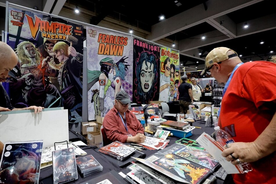 Comic book artist Tim Vigil signs autographs at during 2023 Comic-Con International: San Diego.