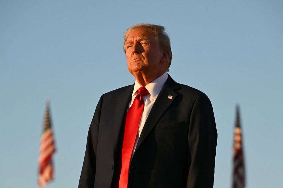 Former US President and Republican presidential candidate Donald Trump looks on during a campaign rally at the site of his first assassination attempt in Butler, Pennsylvania on Saturday.