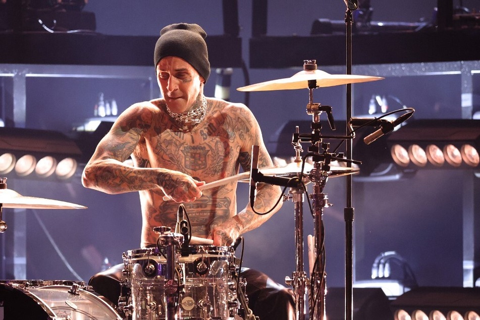 Travis Barker is taking a break from the drums to recover after breaking his fingers.