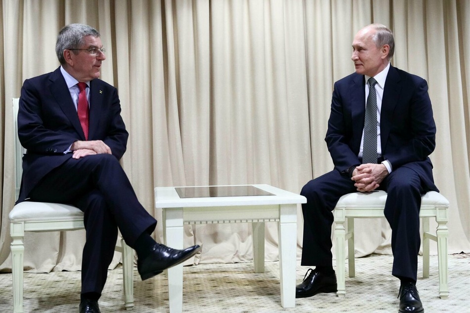 International Olympic Committee (IOC) President Thomas Bach (l) and Russian President Vladimir Putin (r) in 2019.