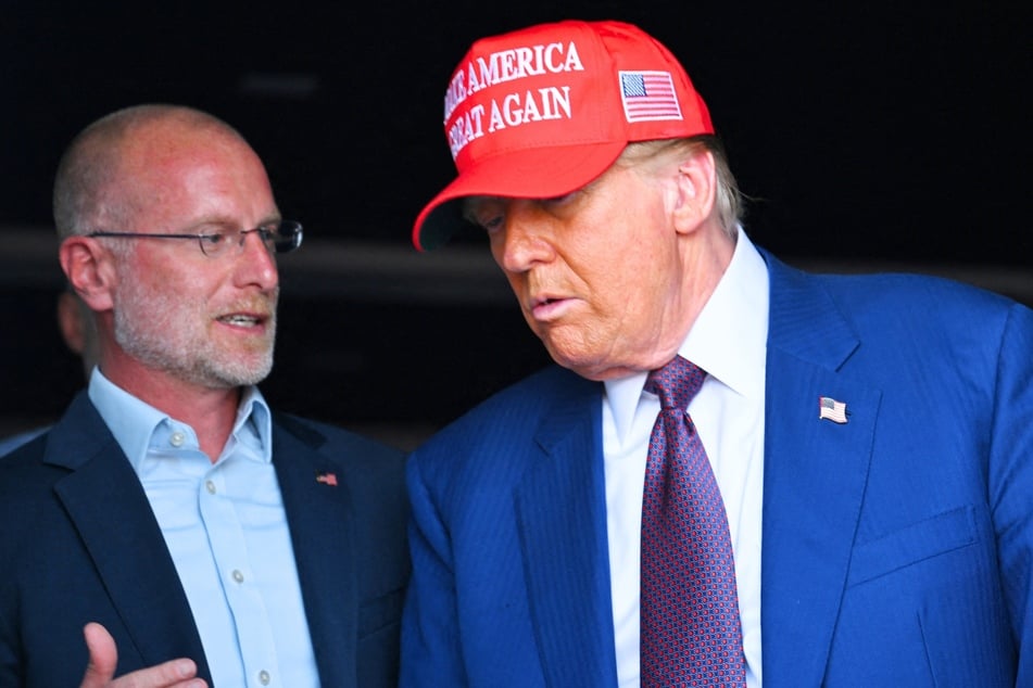 Brendan Carr (l.) and Donald Trump attend a viewing of the launch of the sixth test flight of the SpaceX Starship rocket on November 19, 2024.