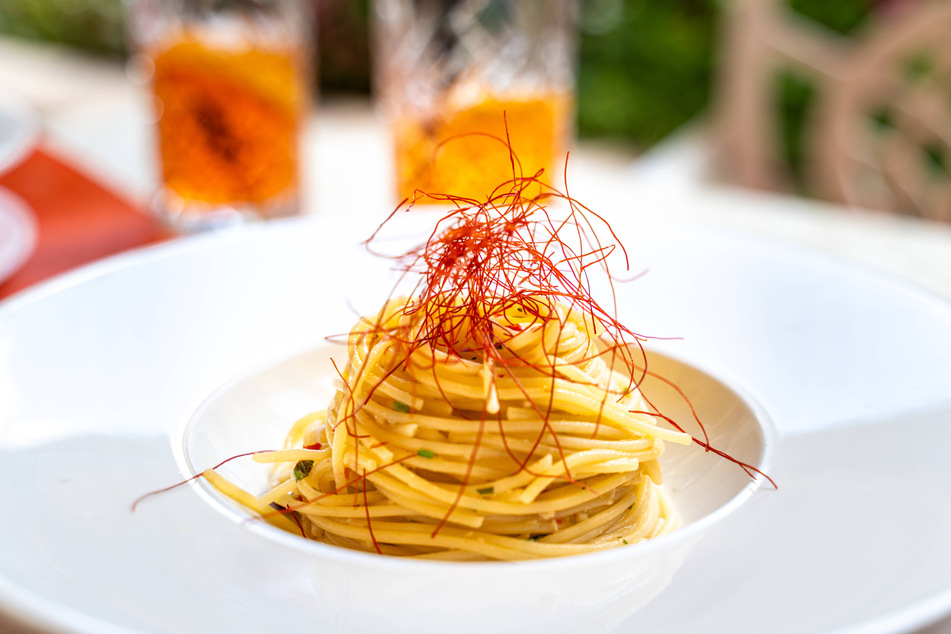 Feel free to serve aglio e olio with a protein of some kind, or add some saffron for a burst of color.