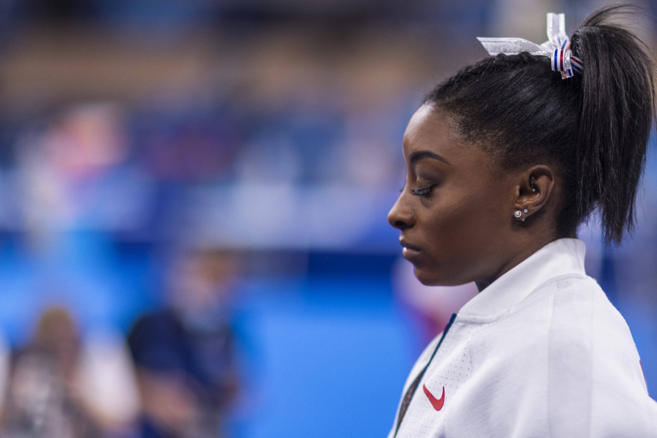 Gymnast Simone Biles dropped out of the women's team event after one vault at the Olympic Games in Tokyo on Tuesday.