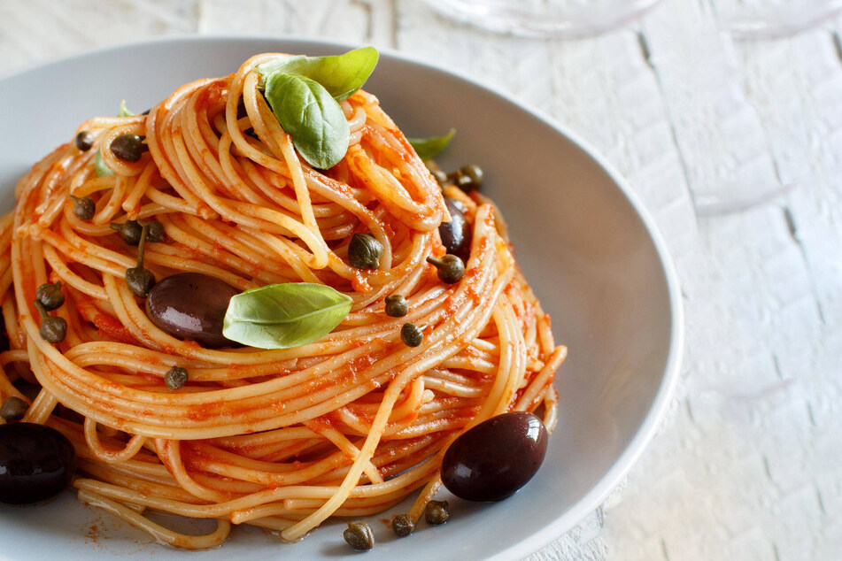 With olives, capers, anchovies, and a little bit of basil added, puttanesca is truly one of the best pasta recipes!