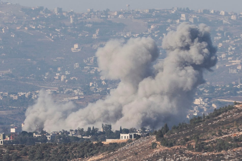 Smoke billows over southern Lebanon, as pictured from Marjayoun, following Israeli strikes on October 20, 2024.