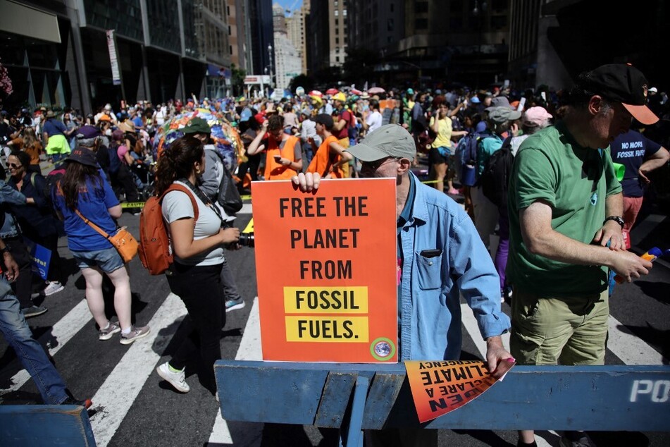 People rally to end fossil fuels ahead of the 78th United Nations General Assembly and Climate Ambition Summit in New York on September 17, 2023.