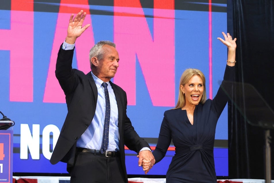 Presidential candidate Robert F. Kennedy Jr. and his wife Cheryl Hines (r.) greeting supporters during a campaign event in Oakland, California on March 26, 2024.