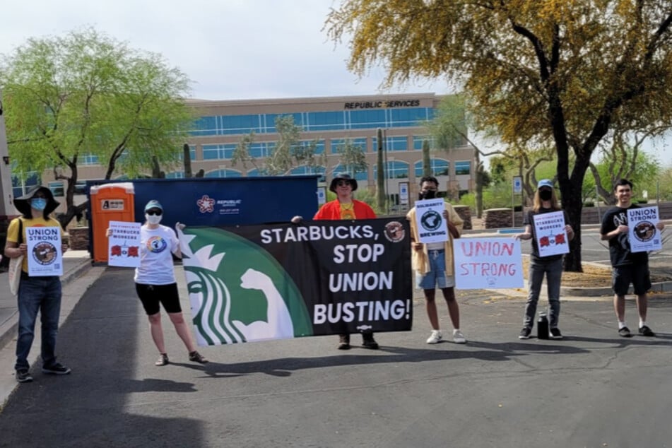 Community members rally in support of Starbucks baristas in Phoenix in March.