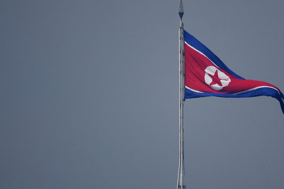 North Korea warns of more "offensive action" after ballistic missile launch