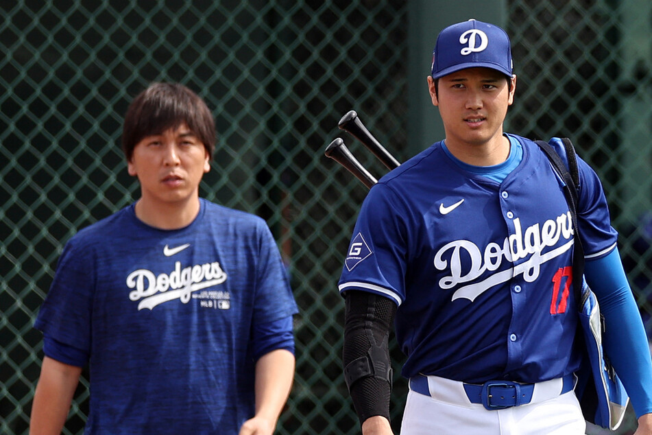 MLB star Shohei Ohtani's former translator Ippei Mizuhara (l.) has been charged with unlawfully transferring millions of dollars from the athlete's bank account.