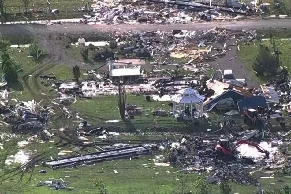 Wreckage is strewn across a property in Valley View, Texas, the day after a deadly series of tornadoes hit the central US.
