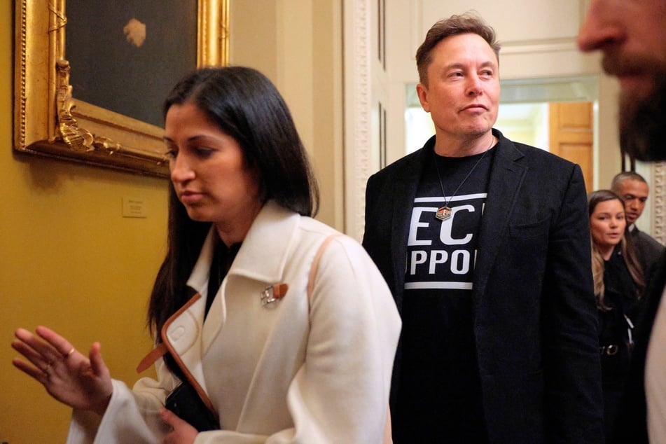 Elon Musk (r.) is accompanied by Katie Miller as he leaves a meeting with Senate Republicans in the US Capitol in Washington DC on March 05, 2025.