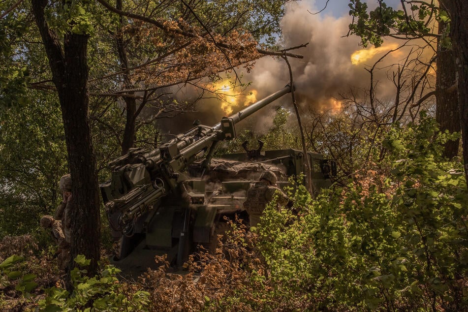 Ukrainian servicemen of the 55th Artillery Brigade "Zaporizhzhia Sich" fire a French-made CAESAR self-propelled howitzer toward Russian positions, in the Donetsk region, on June 27, 2024, amid the Russian invasion of Ukraine.