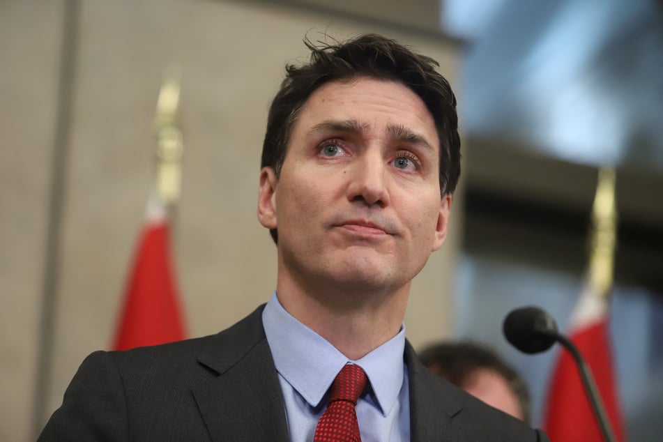 Canada's Prime Minister Justin Trudeau responds to President Donald Trump's orders to impose tariffs on Canadian imports during a press conference in Ottawa.