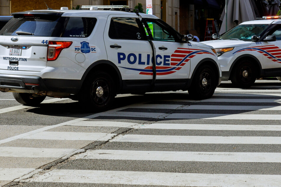 District of Columbia Metropolitan Police blocking a street in Washington, DC (stock image).