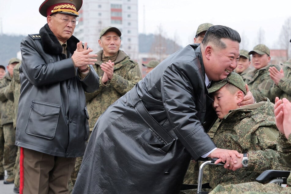 Kim Jong-un reveals details of North Korean troops' role in Ukraine war in rare public ceremony