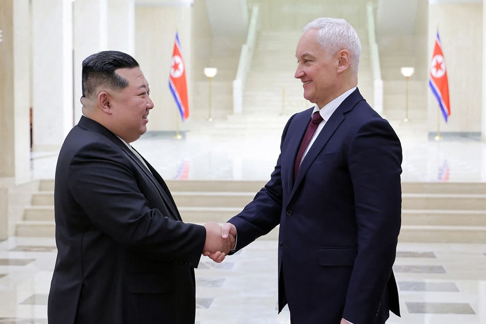 Russian Defense Minister Andrei Belousov (r.) met with North Korean leader Kim Jong Un and agreed to boost military cooperation between the two isolated nations, Pyongyang state media said Saturday.