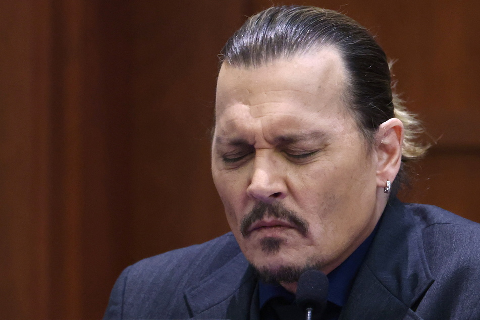 Johnny Depp on the stand during his defamation trial against his ex-wife, Amber Heard.
