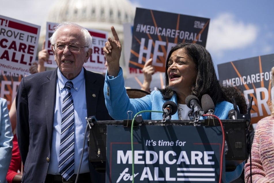 Congressional Progressive Caucus Chair Pramila Jayapal stands alongside Senator Bernie Sanders to announce the reintroduction of Medicare For All.