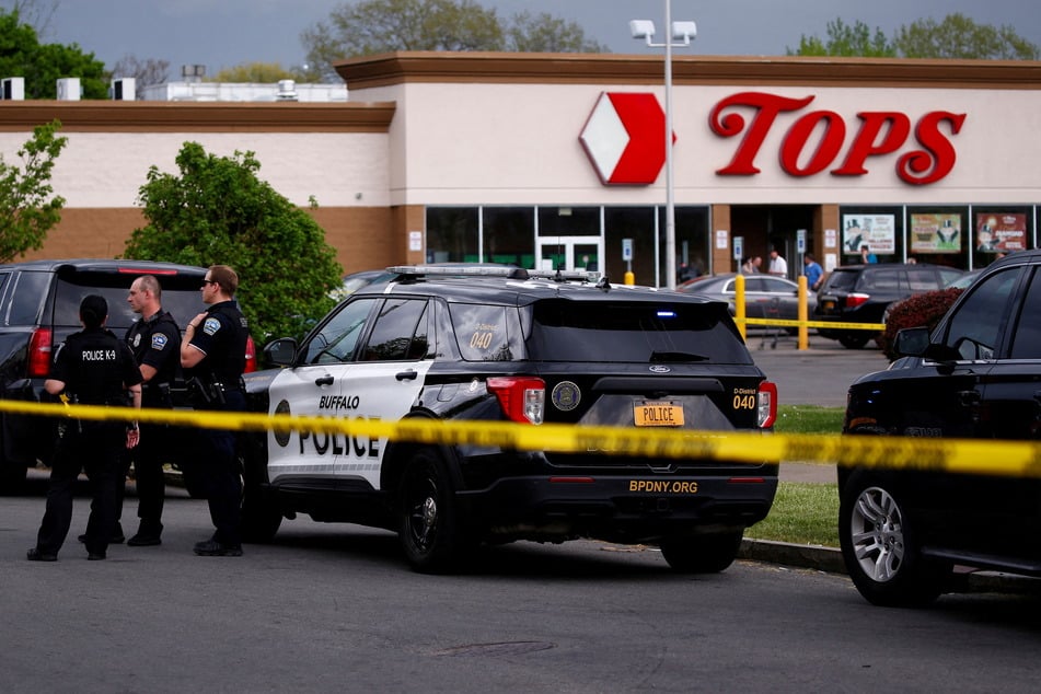 Law enforcement on the scene of the shooting at Tops Friendly Market in Buffalo on Saturday.