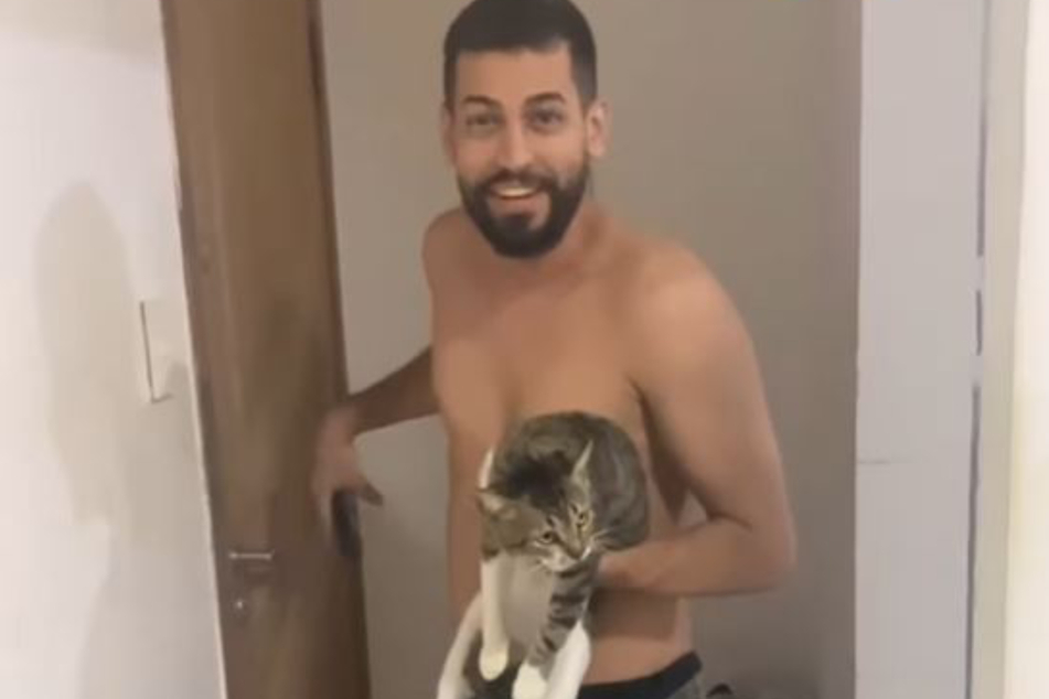 Edwin was super confused when he brought home his escaped cat – where he was greeted by the very cat he thought he'd just caught!