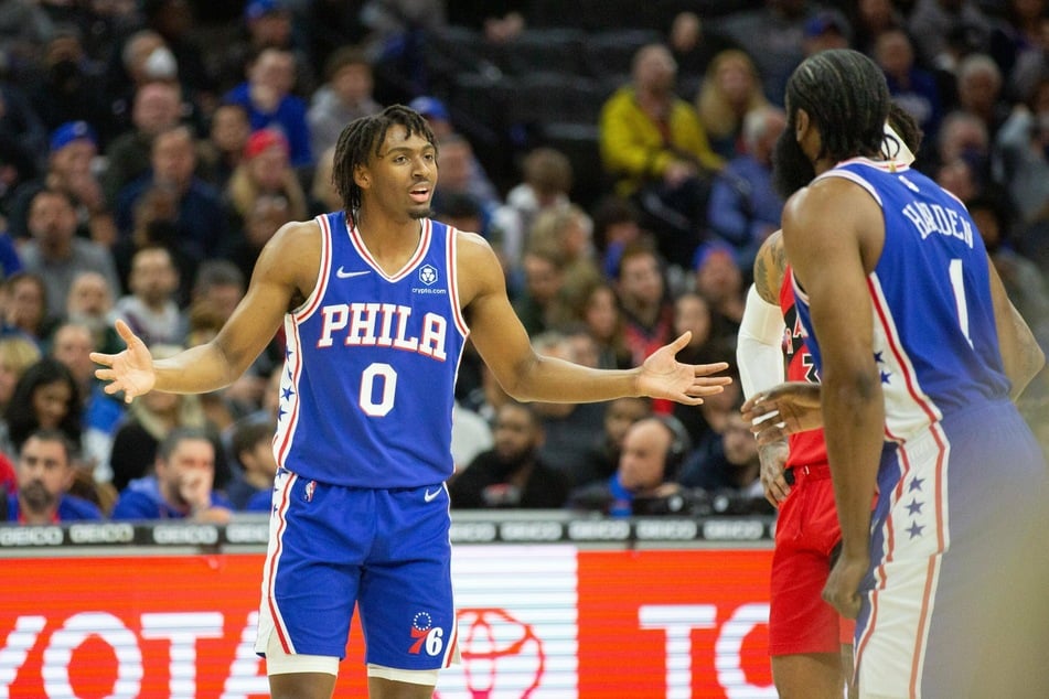 Tyrese Maxey and James Harden argue as the Sixers go down to the Raptors.