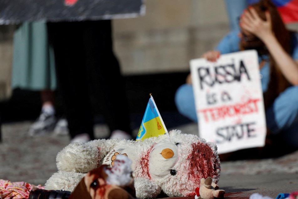 Rescue workers were still working to clear the debris on Tuesday after a massive Russian attack partially destroyed a children's hospital in Kyiv.