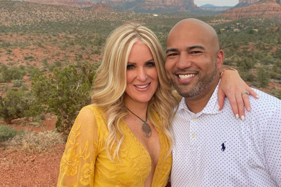 James Whitfield (r.) posed for a picture with his wife, Kerrie Walters Whitfield.