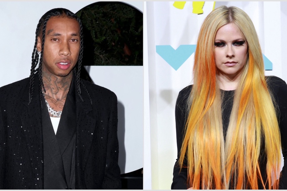 It looks like love doesn't suck for Avril Lavigne (r) after she was spotted locking lips with Tyga!