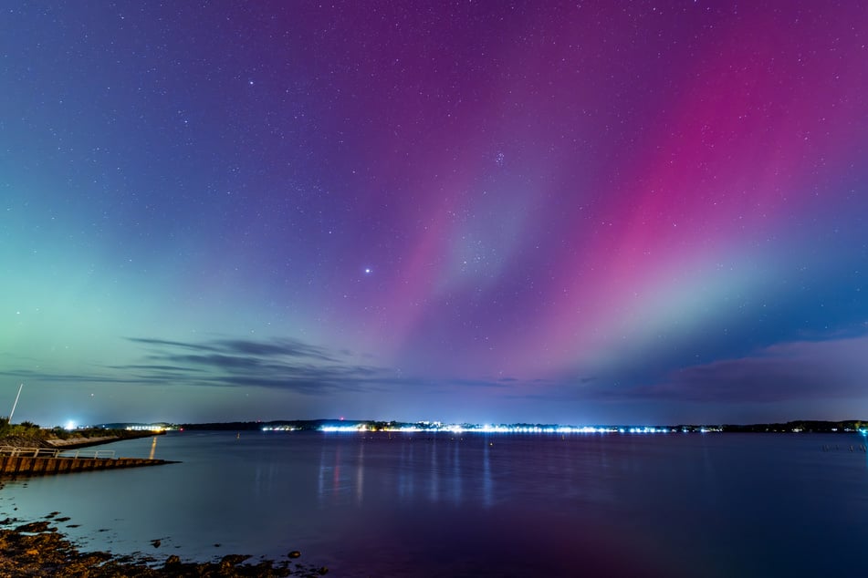 On Thursday, skygazers in many parts of the world were treated to colorful auroras at latitudes beyond the polar extremes where they normally light up the skies.