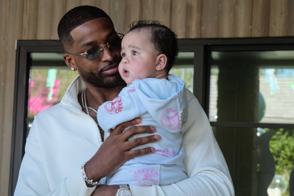 Tristan Thompson with his and Khloé's son Tatum Thompson at their daughter True's birthday party.