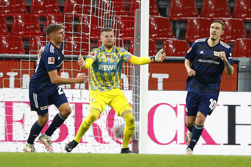Unions Max Kruse (r.) bejubelt sein Tor zum 1:2 neben Kölns Torwart Timo Horn.