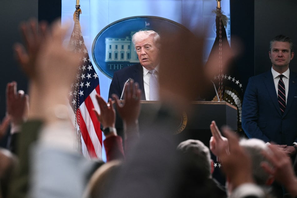 President Donald Trump reportedly promised to pardon a number of his top officials, according to insiders who overheard the conversation.