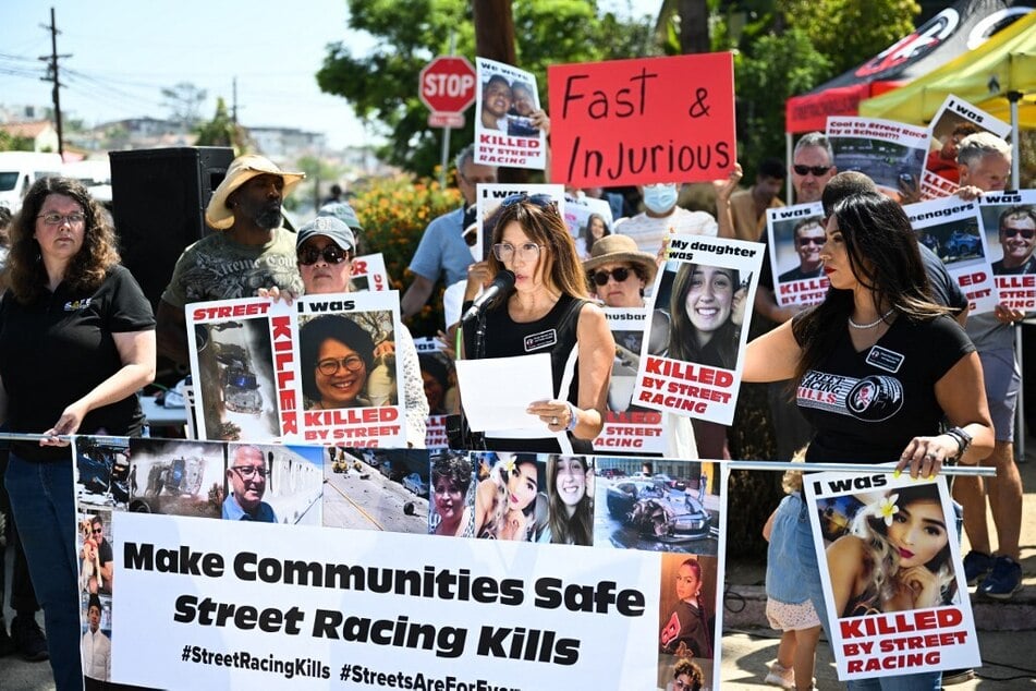 Lili Trujillo Puckett, founder of Street Racing Kills, speaks alongside local residents and supporters during a protest on the increase in street racing takeovers.