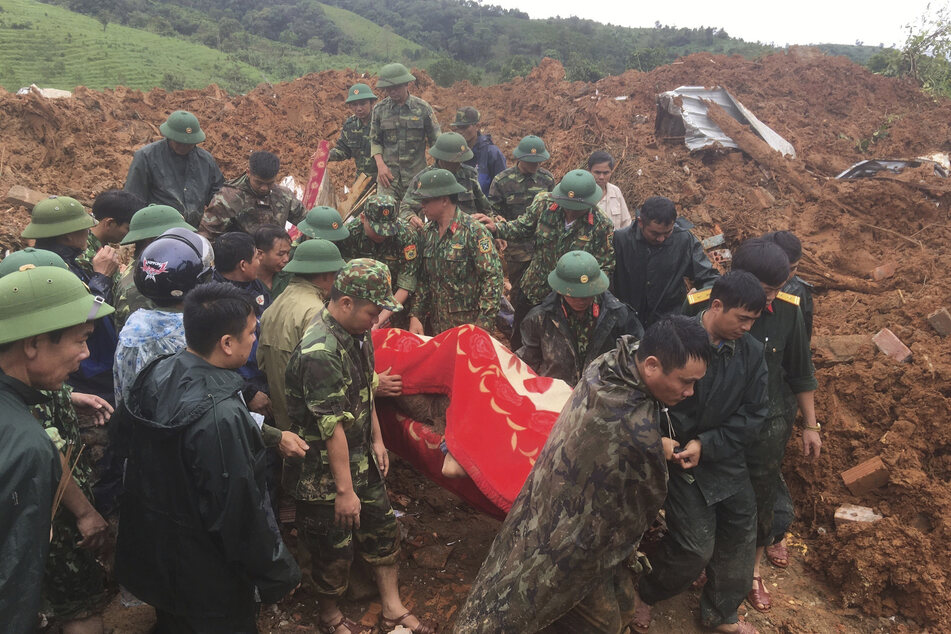 At least 22 army officers were buried in the landslide in central Vietnam.