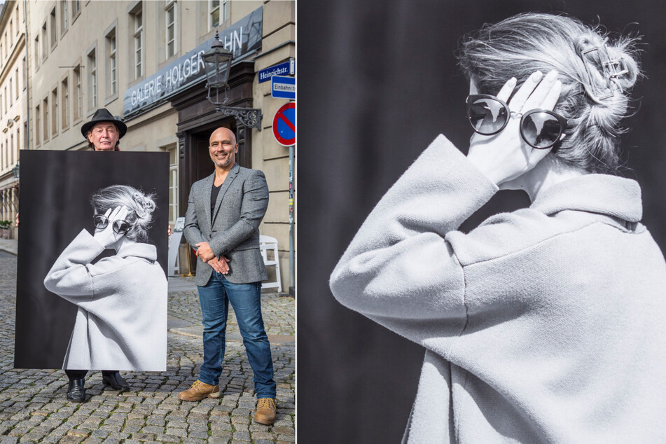 Galerist Holger John (60, l.) und Fotograf Luis Ernesto Sarabia Toledo (52) zeigen eine Fotografie der Ausstellung. Man sieht eine junge Frau mit Sonnenbrille.
