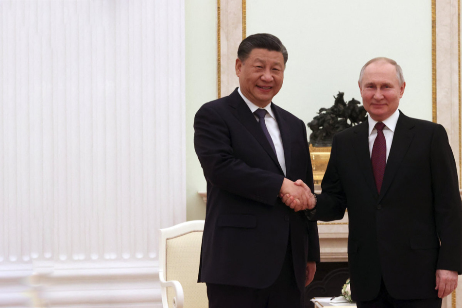 Vladimir Putin welcomes "dear friend" Xi Jinping in big moment for Russia-China relations