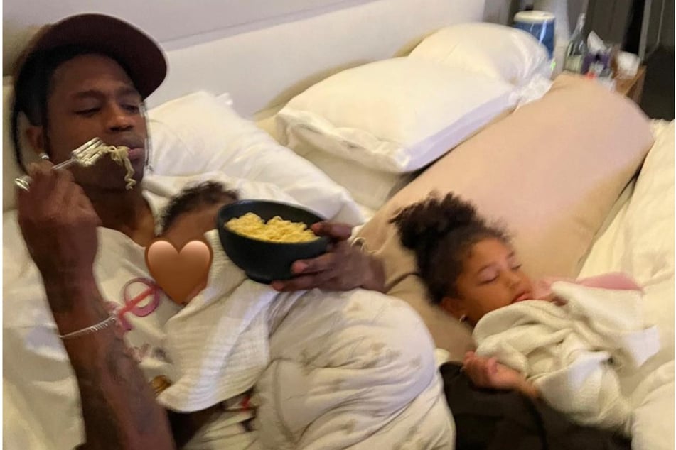 Kylie Jenner posted a snap of Travis Scott (l) with their two children for Father's Day.