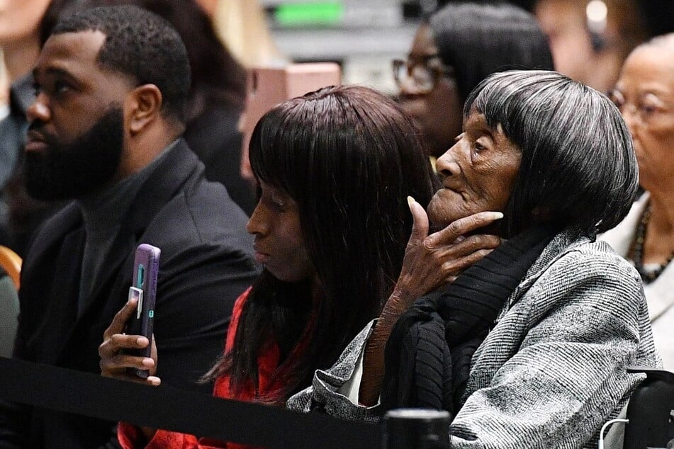 Lessie Benningfield Randle (r.) listens as President Joe Biden speaks during a commemoration of the 100th anniversary of the Tulsa Race Massacre at the Greenwood Cultural Center on June 1, 2021.