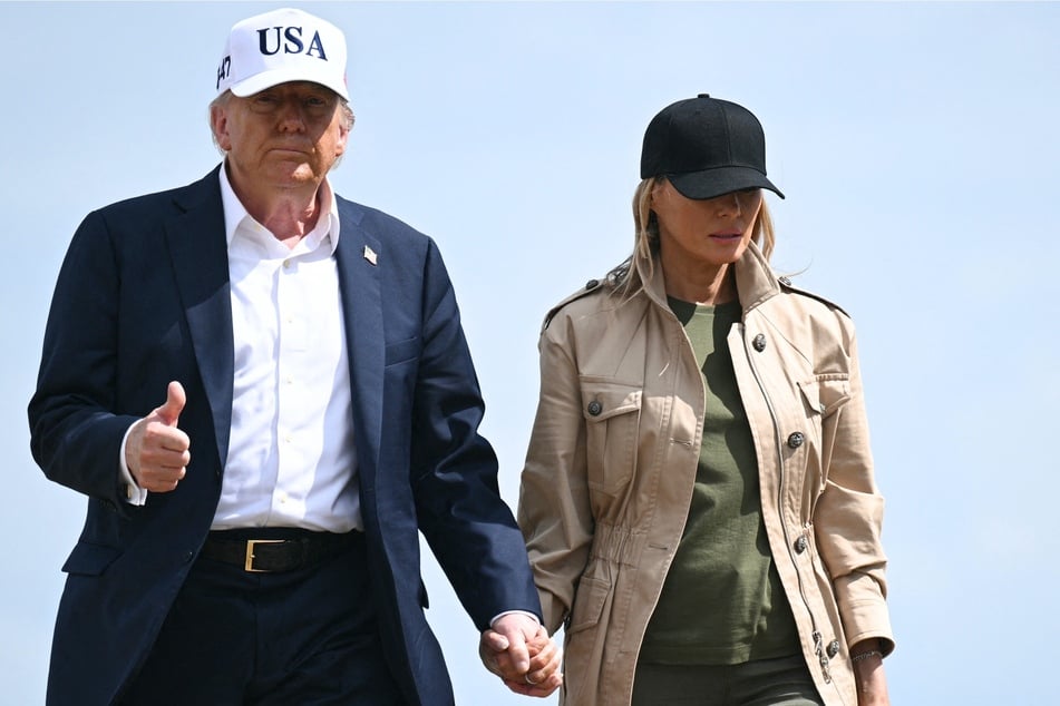 President Donald Trump and First Lady Melania Trump (r.) walk to board Air Force One at Kelly Field at Joint Base San Antonio, Texas, on July 11, 2025.